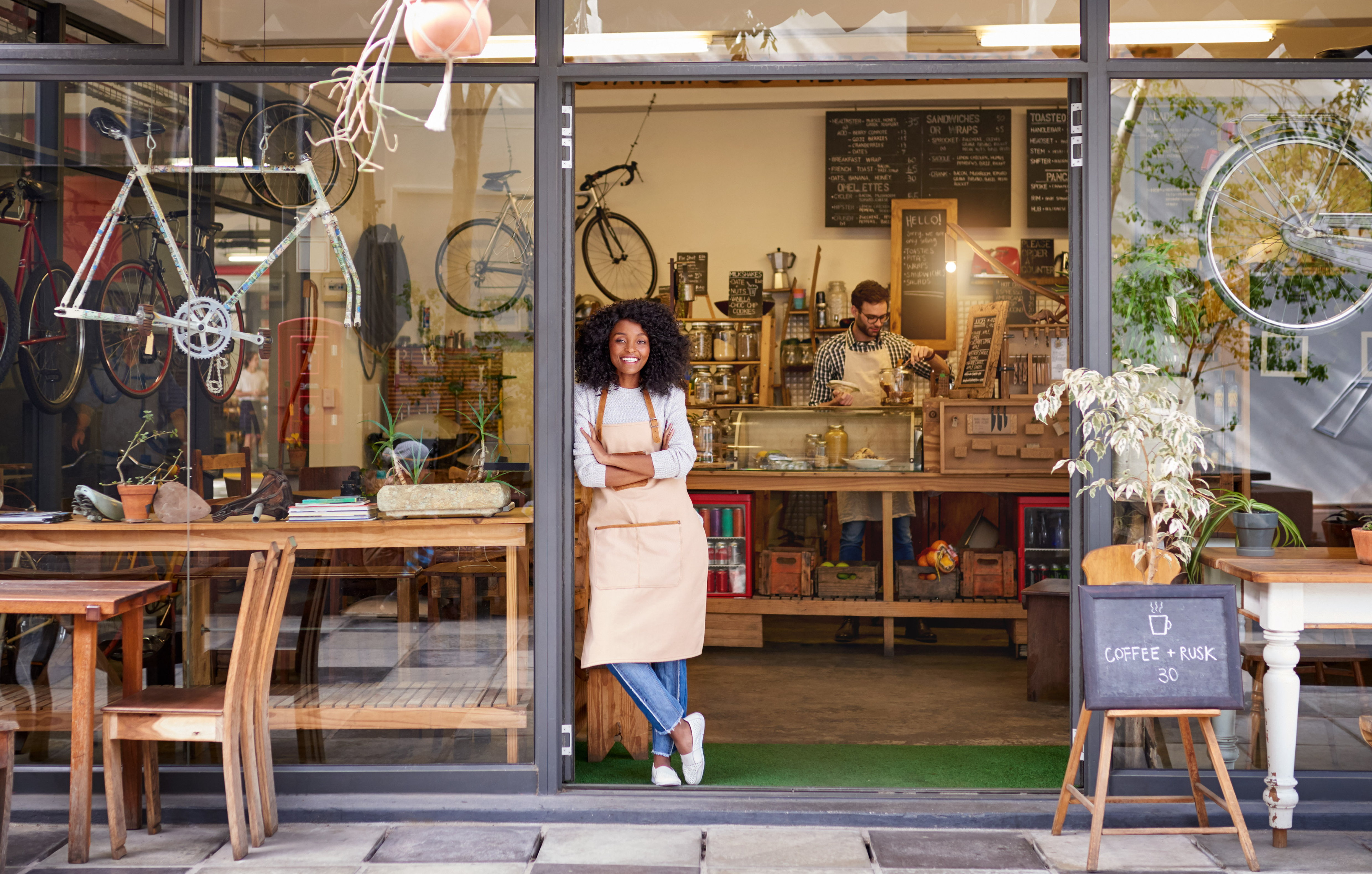 Woman standing at restaurant door